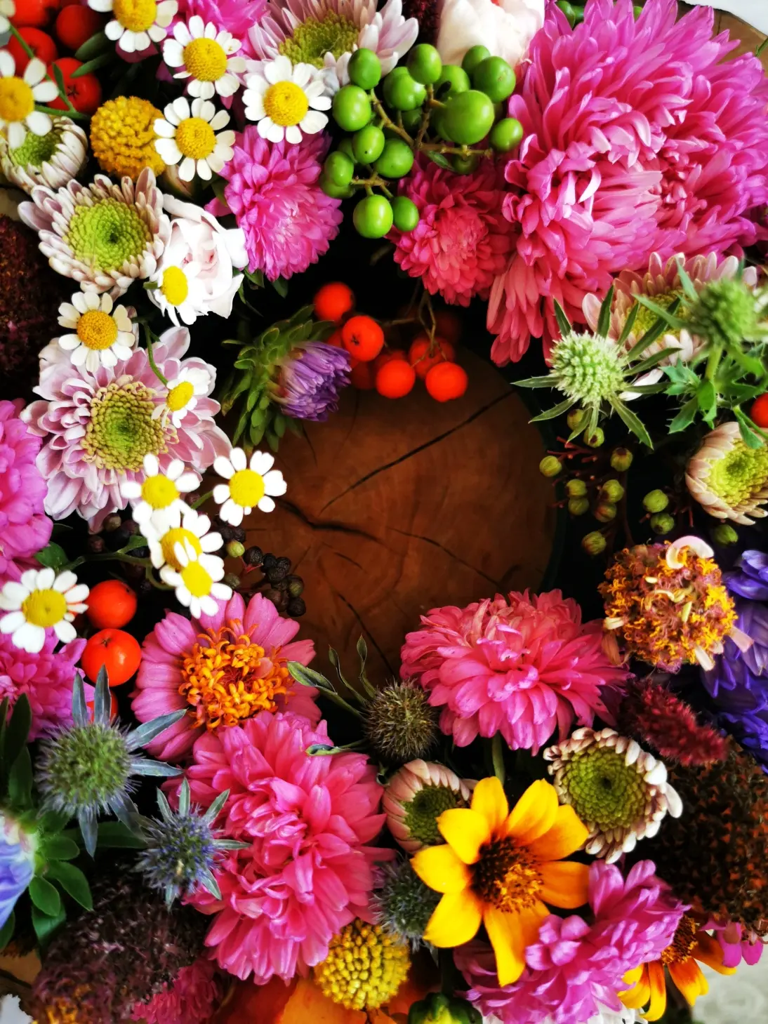 A colourful composition of fresh cut flowers, vibrant with the energy of summer.