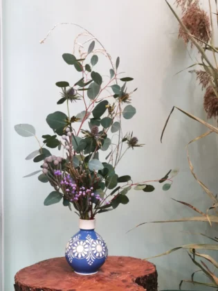 Blue vase with eucalyptus