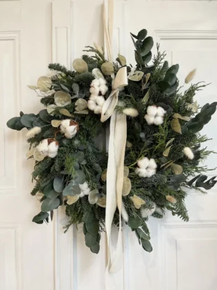 Christmas garland in cream and white tones with cotton and eucalyptus